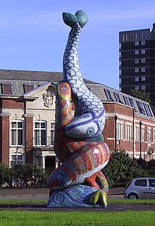 'The De Luci (dancing) Fish' mosaic sculpture on Bronze Age Way roundabout in Erith, Kent by artist Gary Drostle.