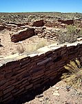 Puerco Pueblo walls of up to 125 rooms at the Petrified Forest National Park[9]