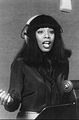 Image 9Donna Summer wearing headphones during a recording session in 1977 (from Recording studio)