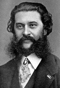 Johann Strauss II with a large beard, moustache, and sideburns