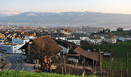Rapperswil-Jona as seen from Kempraten-Lenggis, Jona to the left, Rapperswil and Seedamm to the right, Obersee (upper Lake Zürich) and Lachen (SZ) in the background (March 2010)