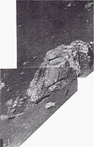 Mottled rock about 50 cm long near Surveyor 1