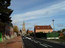 The church and surroundings in Awoingt