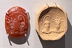 Seal with two facing busts and Sogdian inscription "Indamic, Queen of Zacanta", Kushano-Sasanian period, 300-350 CE. British Museum 119999.[7]