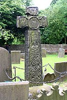 8th-century cross at Eyam in Derbyshire (section missing) with interlace; see here for face with vine-scrolls