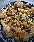 Traditional Algerian olive tagine with chicken and mushrooms