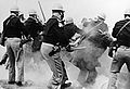 Police attack civil rights demonstrators outside Selma, Alabama, on Bloody Sunday