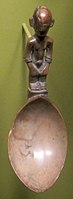 Ifugao rice spoon guarded by a wooden figure