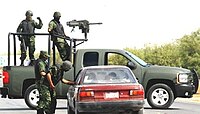 A Mexican Army Chevrolet Silverado equipped with a Mk 19 at a military checkpoint in March 2009