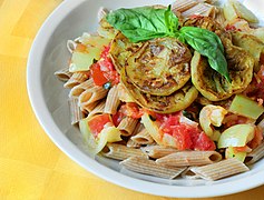 Penne with eggplant and basil in yogurt-tomato sauce.