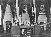 Franklin D. Roosevelt seated at the Hoover Desk