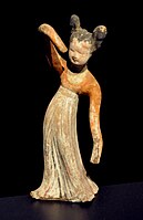 Dancing girl, the unfired paint surviving unusually well