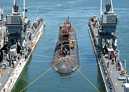 Arco (ARDM-5), an ARDM-5-class floating dry dock, servicing a Los Angeles-class submarine