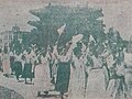 Women parade and celebrate in front of Namdaemun after the North Korean capture of Seoul, 1950