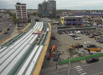Aerial view of an elevated light rail station under construction
