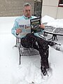 Barry Karr reading Skeptical Inquirer at the Committee for Skeptical Inquiry's Amherst headquarters, 2014