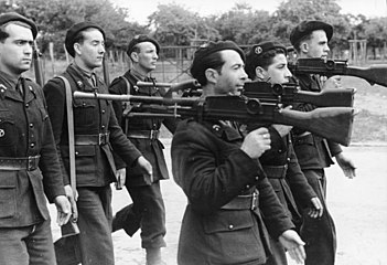 Members of the Milice with captured Bren guns.
