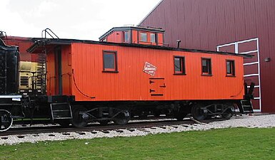 A cupola-style caboose with an "angel seat" above