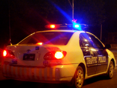 An Islamabad Traffic Police 2007 Toyota Corolla patrolling at night.