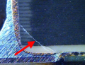 Micrograph of broken ceramic in a MLCC chip