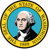 A circular seal that contains the image of George Washington with a light blue background, along with "The Seal of the State of Washington" and "1889" written clockwise within a yellow banner surrounding Washington.