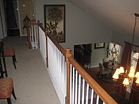 Simple balustrade of turned wood balusters of a style common in North America