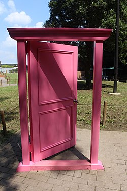 "Anywhere Door", a pink door used as a gadget in "Doraemon"; users can travel anywhere on their wish by turning the door's knob