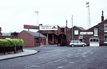 Entrance to the Bootham Crescent association football ground, the entrance sign and a stand visible