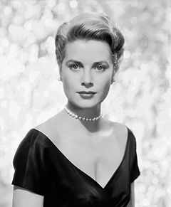 A black-and-white photograph of Grace Kelly in 1955