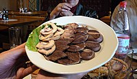 Horse meat platter. Kazakh cuisine revolves around mutton, horse meat and various milk products.