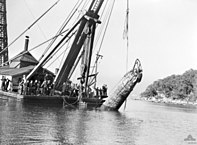 M-21 being raised by a floating crane on 10 June 1942