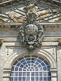 Stone relief the coat of arms of the United Kingdom of Portugal, Brazil and the Algarves in the Basilica of Bom Jesus in Braga
