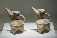 Two white ceramic pitchers (guī 鬹)