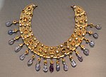 Collier; late 6th–7th century; gold, an emerald, a sapphire, amethysts and pearls; diameter: 23 cm (9.1 in); from a Constantinopolitan workshop; Antikensammlung Berlin (Berlin, Germany)[214]