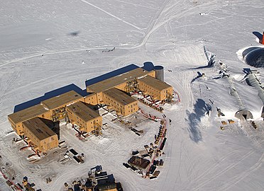 An aerial view of the Amundsen–Scott Station in January 2005. The older domed station is visible on the right-hand side of this photo.