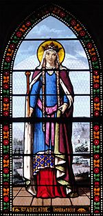 Saint Adelaide on a stained glass window by Lorin, in the Church of Toury.