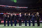 President Donald J. Trump participates in on field ceremonies at the 2018 College Football Playoff National Championship between the University of Alabama Crimson Tide and the University of Georgia Bulldogs