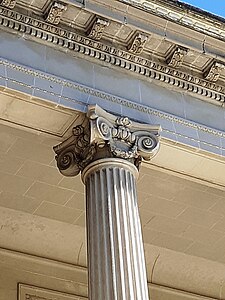 Neoclassical Ionic capital with a festoon between its volutes, part of the entrance portico of the Villa Eilenroc, Antibes, France, by Charles Garnier, 1860-1867