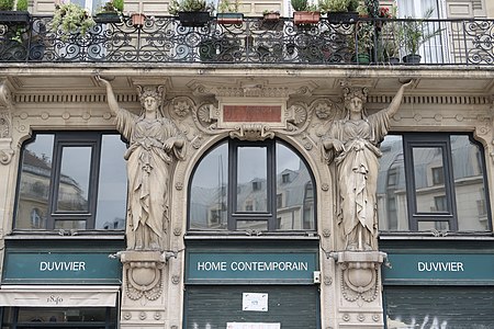 Neoclassical caryatids of Rue des Halles no. 19, Paris, designed by Jean Lobrot and sculpted by Charles Gauthier, 1868