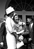 In 1961, Louise Shepard wore a lampshade hat with front bow at a NASA award ceremony for her husband Alan B. Shepard