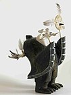 Toy Angakkuq (shaman); 6 February 1998; serpentine, caribou bone & feathers; by Palaya Qiatsuq