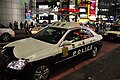 Toyota Crown with a raised lightbar in Shibuya