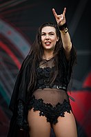 Elize Ryd making the sign at a concert in 2018