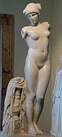 The Esquiline Venus, 1st century AD Roman copy of a late Hellenistic artwork from the 1st century BC, with a snake depicted on the vase at the base and a woman wearing a royal diadem.[88]