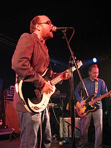 Schneider performing at The Black Cat nightclub in 2006
