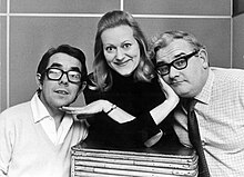 Black and white Picture of Josephine Tewson flanked by Ronnie Barker and Ronnie Corbett