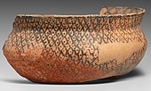 Fragment of a bowl; 5600-5000 BC; 8.2 cm; by Halaf culture