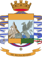Coat of arms of the Guardia di Finanza, depicting the Cimon della Pala