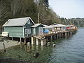 Stilt houses along Puget Sound in Fragaria, Washington, United States