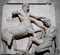 Sculpture of a fight between a man and a centaur.